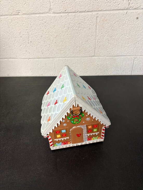 Loungefly Handbags - Loungefly Stitch Shoppe Minnie Gingerbread House Crossbody ( damage last photo )